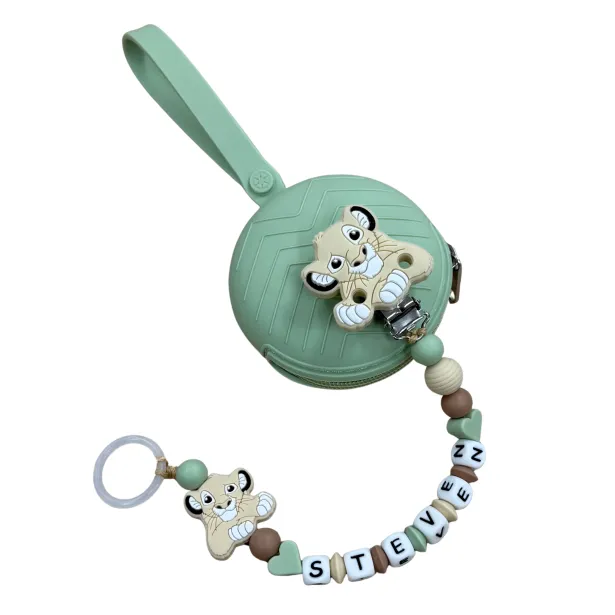 Babyjart Chaîne de tétine PRESTIGE LION en silicone avec nom, crochet / adaptateur de tétine MAM et CHICCO